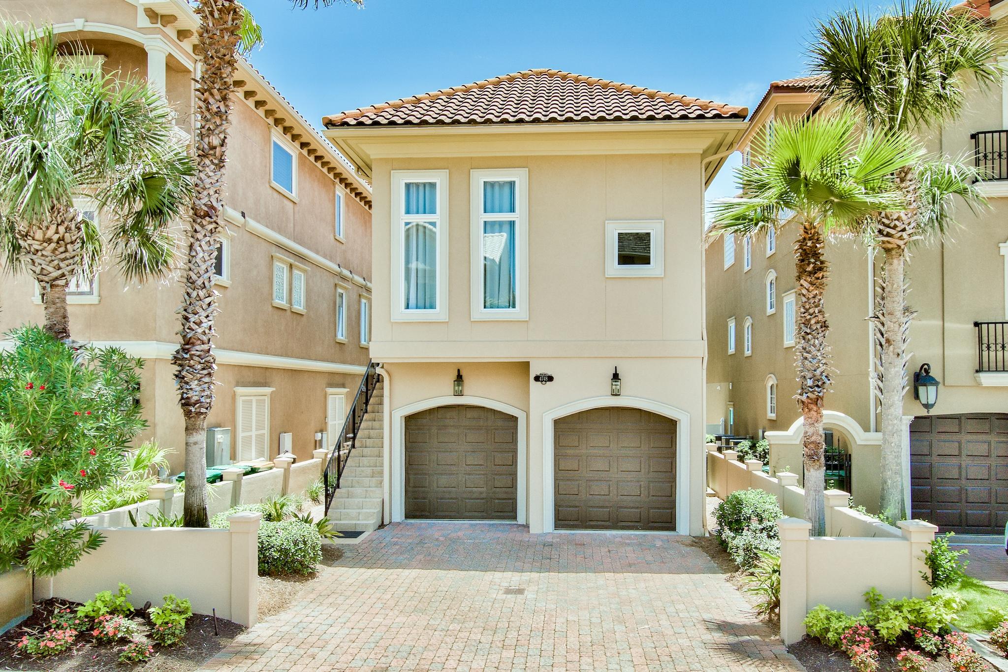 Completely remodeled 2020! Contemporary Coastal Design three bedrooms plus a sunny private sitting area keep guests in luxurious comfort. Coffered, ceilings and hardwood floors complete the stunning details. A remodeled chef's kitchen with ample storage is open to living and dining. A two car garage and sufficient storage satisfy owners and renters alike. This award winning home is one of the best home to enter the market in years and will not last