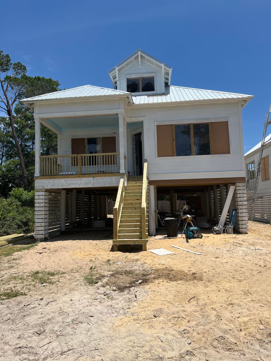 New home south of Hwy 30A to be completed  August 1st. This location offers great beach access as well as access to Eastern Lake. Quiet neighborhood in Seagrove and convenient to shopping and Restaurants.  Ideal for a rental home or permanent residence. Home has swimming pool and covered parking.