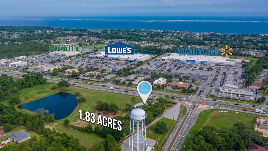 SITE PLAN(S) AVAILABLE. Fast Food plus Retail or Dual Retail Site Plans both located in attached documents.  SELLER WILL FINANCE WITH $350,000 DOWN, $4,657.12 per month, 5 YR balloon.   Ideal for redevelopment (SEE SITE PLANS) or expansion of existing operation with value add, located directly in the heart of the exploding Gulf Breeze area.  As expansion & density close from all sides, this cornerstone commercial parcel places one in a high traffic, high visibility location, directly across from national brands such as Wal-Mart and Lowe's, among others.  Metal building & roof; new windows; open retail space and several office spaces on first floor, & second floor.