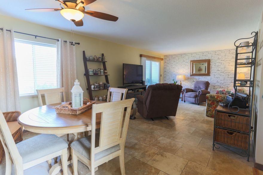 Nicely renovated, ground floor unit in highly sought after Finisterra Condominiums.  Travertine tile throughout, stainless steel appliances in kitchen, new HVAC system installed in 2019!  This gated community is surrounded by beautiful Choctawhatchee Bay and Lake Clyde.  The complex has a swimming pool, tennis court, sauna, kayak racks and is perfect for fishing, snorkeling, swimming, paddle boarding, kayaking, and more.   *Washer & dryer convey with unit*Assigned parking spot is conveniently located directly behind unit, a straight shot as you drive in from the gate *Community laundry facility onsite*Unit did not incur any damage from Hurricane SallyBuyer to verify all measurements