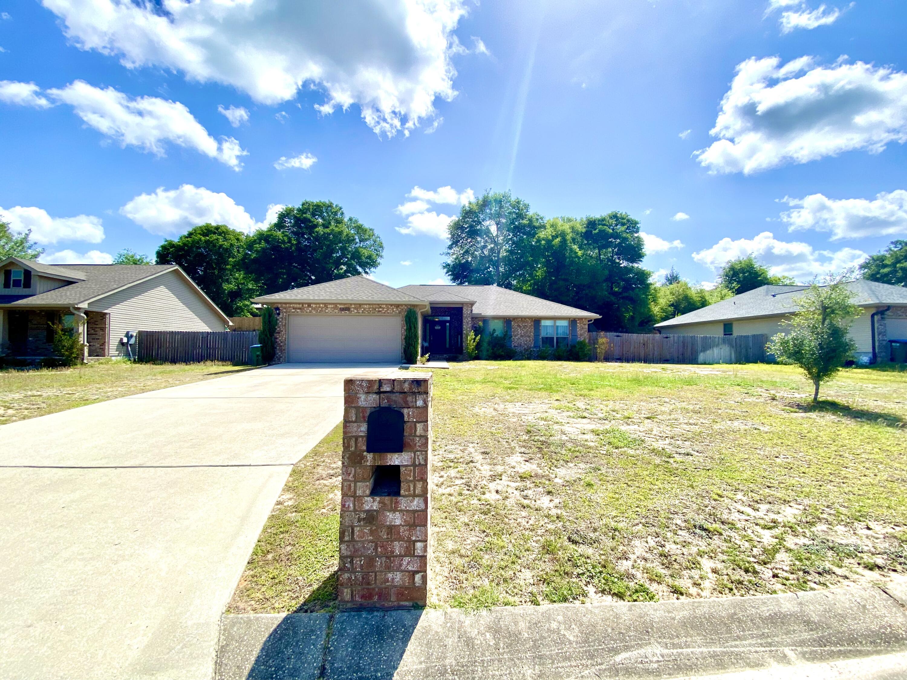 Only 4 yrs old! Affordably priced! 1 owner home! This adorable 4 bd 2 bath brick home is conveniently located and offers an easy commute to area military bases. You'll love the vaulted ceiling, the open floor plan with a great flow and use of space,, the rustic wood accent wall in living room, the split bedroom design and the large master suite with tray ceiling. The kitchen features granite counter tops, stainless appliances and a breakfast bar, the dining area overlooks the fenced backyard. The master bathroom boasts a garden tub and separate shower, double vanity, and a nice walk in closet.If you are looking for an affordably priced move in ready nearly new home this home is a must see. Call to schedule your private showing today because this beauty will not last long!