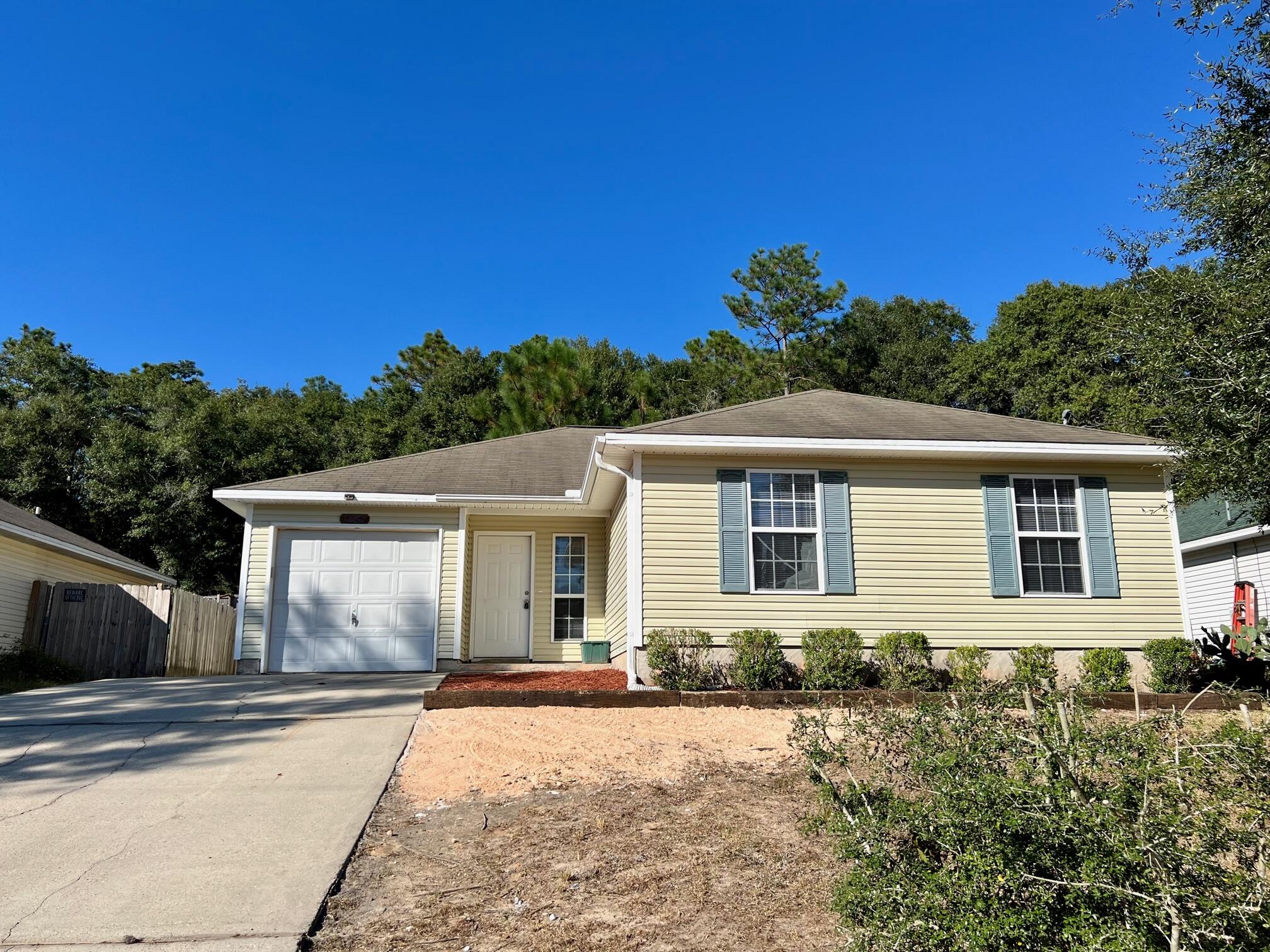 Available now. Located in the heart of Crestview, great 3/2 home on cul de sac. New paint, refrigerator, blinds and more. Ceramic tile and laminate flooring throughout. Open concept floor plan, spacious bedrooms, with natural light. 1 car garage with covered front porch and covered back porch. No inside smoking or vaping. Pets may be allowed with owner approval and a $400 non-refundable pet fee. Affordable and convenient. LAWN CARE INCLUDED IN RENTAL RATE.