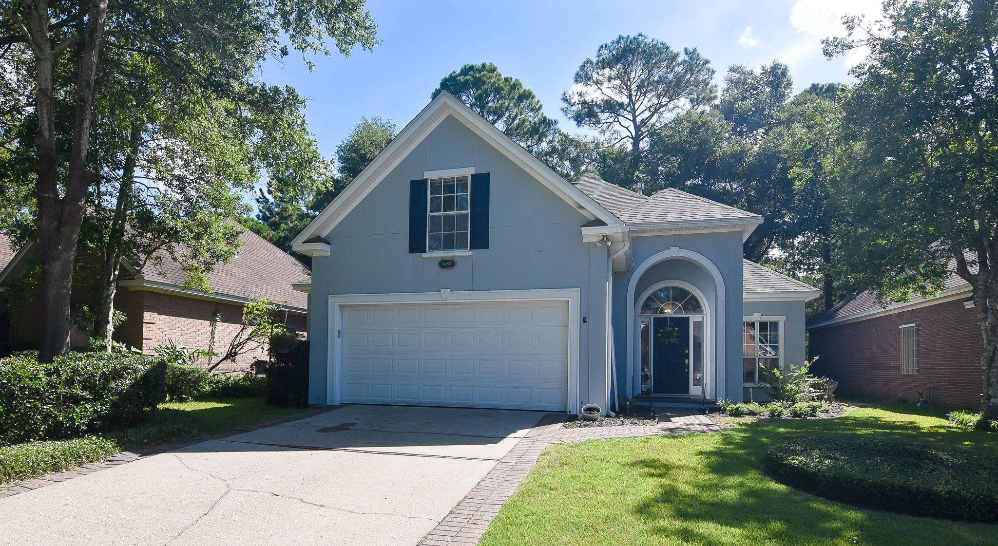 Oakmont Place, one of BWB's finest subdivisions, and within minutes to schools, parks, shopping and dining! This two story, 4-bedroom, 2-1/2 bath freshly painted home has a split floor plan offering the first floor master plenty of privacy from the additional 3 bedrooms and 2 new HVAC units and air duct system (2018) - a $30,000 improvement! The interior flows nicely with several open living spaces and upgraded finishing touches like recessed lighting, double crown moldings, and smooth ceilings. A roomy kitchen features 42'' upper cabinets, a complete stainless steel appliance package, a large eat-in space, and low maintenance tile flooring. The living/dining room combo has plenty of wall space and a gas-log fireplace. Escape to your master retreat featuring a dual vanity, (click more)