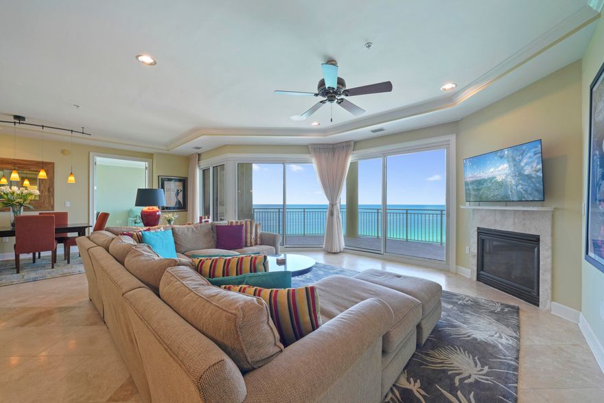 This stunning 4-bedroom, 4-bathroom direct Gulf-front Villa boasts 2,720 sq. ft. of living space and is offered fully furnished. It is one of the few units in the Miramar Beach area that offers a Gulf view from each of the four bedrooms! From the moment you step into this beautiful Villa, you'll be captivated by the expansive views from every angle. Upon entering, you'll be welcomed by an open-concept living space perfect for entertaining guests. The living area features floor-to-ceiling windows that flood the space with natural light and provide panoramic views of the emerald-green waters of the Gulf.  This Villa's features include: travertine flooring in the foyer, living area, kitchen, hallways, and bathrooms; recessed lighting throughout all living areas; surround sound flush mount speakers in the living area; a natural gas fireplace; custom cabinets and granite countertops; soft-close drawers in the kitchen and bathrooms; a bar nook; and a spacious laundry room equipped with a utility sink.

The Chef's Kitchen is a true highlight, featuring granite countertops, a premium stainless steel appliance package, including a "Monogram" range hood, "GE Profile" refrigerator, 5-burner natural gas cooktop, two dishwashers, double sink with individual disposals, and an ice maker.

The Primary Suite is a true oasis, offering "His & Hers" walk-in closets, trayed and coffered ceilings, and a sitting area. The Primary Bathroom features dual granite vanities with soft-close drawers, a temperature-controlled steam shower with dual heads, a spa-like jetted soaking tub with a travertine surround, and a separate water closet.

Grand Dunes offers: "Super Quiet Interiors", semi-private elevators leading into the private foyer of your Villa, 24 hour security, gated entry, lush landscaping, 2 levels of gated underground parking for Owners, private heated pool, Owner's Lounge with Fitness Room, Over-Flow Suites for guests, 200' of deeded beach, a Lagoon Style Gulf Front Grand pool area, lighted waterfall and beach service.

"Grand Dunes is the Emerald Coast's Most Desired Rental Restricted Beachfront Development"

Call to schedule your private viewing of this beautiful Villa today!