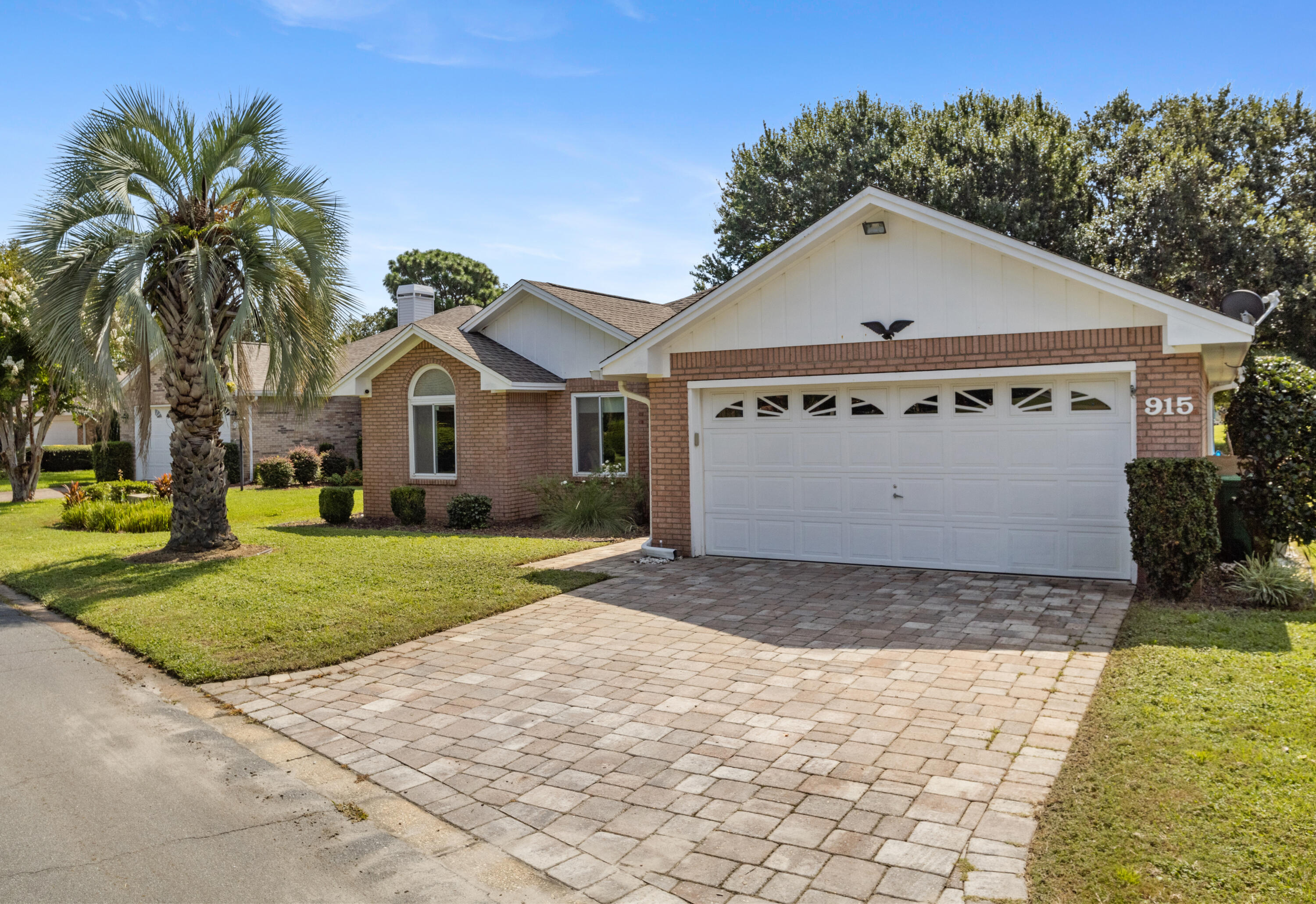 Located in the charming gated Shalimar Pointe golf course community, this single-level brick home offers practical updates and a functional layout. Recent improvements include new interior paint, carpet, updated kitchen lighting and hardware, and renovated bathrooms. The primary suite features two closets and access to the heated/cooled Florida room. Additional highlights include cathedral ceilings, bay window dining area, epoxy garage floor, generous natural light, sprinkler system, gutters, and paver driveway. Situated between the 3rd + 9th holes and in Flood Zone X (no flood ins required), this home also offers an assumable 3.75% VA loan to a qualified VA buyer. Convenient to military bases, golf, and the beaches of the Emerald Coast. Video tour available upon request. Welcome home!