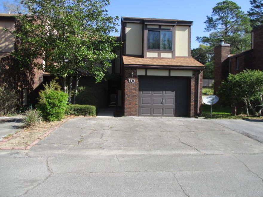 Spacious townhome located just outside the back gate of Eglin AFB in the serene waterfront community of Hidden Cove. This  end unit offers ample light from side window downstairs.  Wood burning fireplace in Living room, fenced rear patio area with walk gate to side. Bathrooms have been updated including flooring, tubs, sinks, vanities & lighting. Additional upgrades include the 3 windows upgraded to impact windows, newer sliding glass doors, wind rated overhead garage door, stylish ceilings(no popcorn),crown molding,& hardie siding.  2 Parking spaces in front of unit +1 car garage. Hidden Cove is a waterfront community offering residents pool, excercise room & dock for daily swimming or launching your kayak.*Unit does have aluminum wiring* Roof  2014 . Boat slips can be rented thru assoc