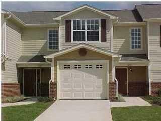 NEW IMPROVED PRICE! LOOKS LIKE NEW! Seller paid HOA special assessment $3870 for roof replacement starting soon. Very desirable townhome with attached 1-car garage located south of I-10. Interior tastefully updated ($23,913 investment) showcasing modern fixtures, new appliances, new paint and carpet, luxury vinyl flooring in living room, 50-gal hot water heater, blinds throughout, fans, light fixtures, Honeywell thermostats, etc. Living room is filled with natural light offering a warm and spacious feel. Well-designed kitchen with functional layout makes cooking great. Walk-in closets in all three bedrooms add extra convenience. Home backs to a nature preserve for tranquility and privacy. See today and experience it for yourself. Visitor parking across street. Community Pool