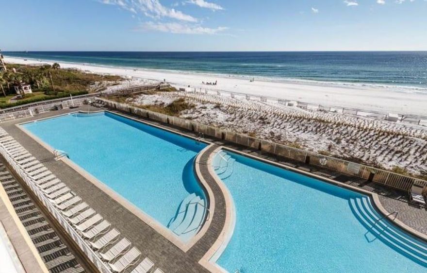 This lovely condo is your ticket to the fabulous beach lifestyle.  Panoramic view of the Gulf of Mexico from your balcony.  Stylish decor with stainless appliances. Make vacation memories and/or take advantage of the lucrative rental market. The bunk room means there is plenty of room for a big family or extra heads in beds for rentals, sleeps 9. Beautiful gulf front pool and plenty of fun restaurants and attractions in the area. Buyer to verify all information.