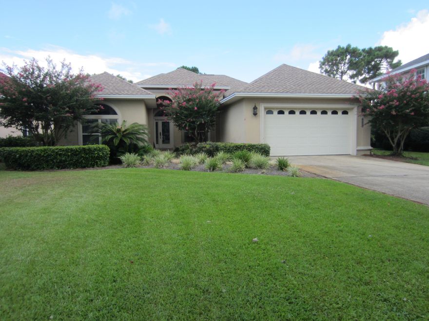 As you drive down the cul-de-sac you'll fall in love with this beautiful well kept and rarely used 2nd home. It's almost like new! Beautiful crown molding in this open floor plan with high ceilings & plenty of natural light throughout. Kitchen has breakfast area and large pantry. Large master bedroom opens to pool area. Master bath has sky light, double sinks, separate shower and garden tub. Large walk in closet also. 2nd bedroom also opens to patio and pool area and has very large closet. Large family room is open with gas fireplace and opens to large enclosed heated salt water system pool overlooking the lake. AC is 5 years old. New pool heater. New sprinkler pump. Located in the beautiful gated community of Emerald Lakes which offers 7 lakes, sidewalks, large community pool,2 lighted