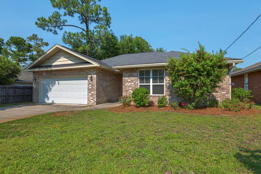 Perfect Niceville Location! Minutes from Publix, Walmart, Plew Elementary School and conveniently located to Eglin AFB and Destin's Beaches. You might say this home is in the middle of all that Niceville has to offer. Built in 2012 this 3 bedroom 2 bath home has all the newest features. The kitchen includes granite counter tops, stainless appliances, countertop bar area, pantry, pendant lighting, and dark wood cabinetry. With the split bedroom floor plan, the master suite with it's large walk-in closet is located off the kitchen and the two guest bedrooms and guest bath are on the opposite side of the home. The home has tile throughout the main living and carpet in the bedrooms. Rounding off the interior is a large laundry with custom cabinetry. For your outdoor enjoyment, CLICK MORE this privacy fenced yard also offers a covered patio. Need extra storage for lawn/garden or extra equipment? This home has a small outdoor yard building that is perfect for all your outdoor needs.