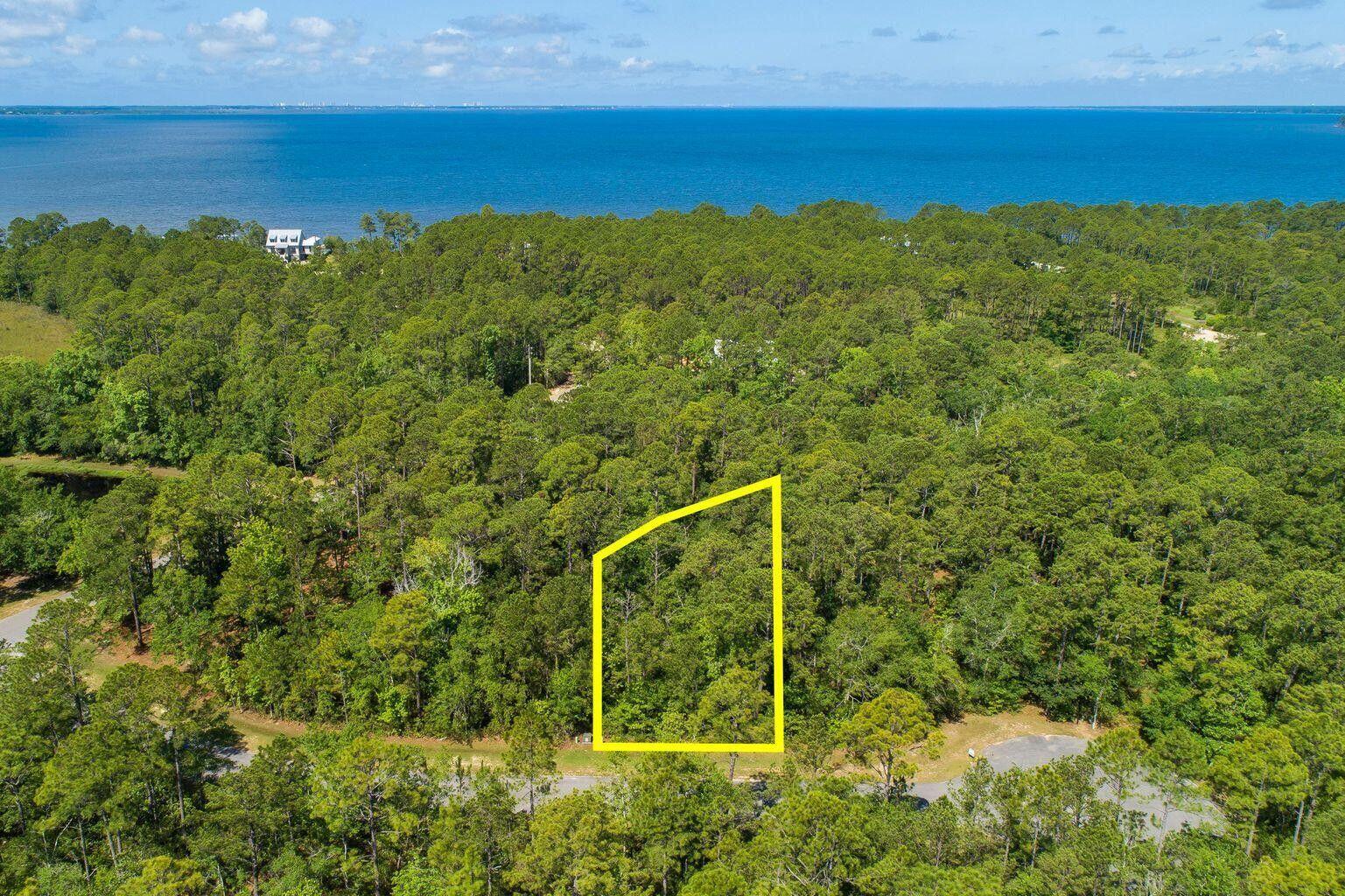 Build your dream home on this private lot on a quite cul-de-sac within walking distance to the Choctawhatchee Bay with in beautiful Bay Harbour! This community has an abundance of amenities with a very low HOA dues, low taxes and no buildout time requirements. This professionally landscaped and impeccably maintained bay front neighborhood is the perfect place to build your dream home. Bay Harbour is Freeport's premier upscale lifestyle community. Amenities include walking paths, reflecting ponds, tennis courts, owners' boat & RV storage, community pier, boating, fishing, hiking and picnic pavilion.