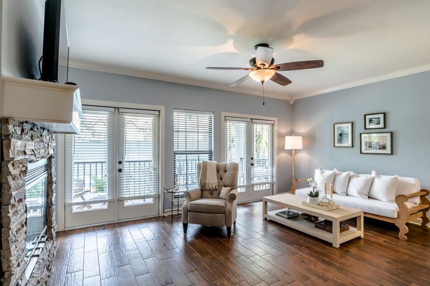 This cutie is a MUST SEE! Relax on your spacious covered patio and stroll over to the community dock to enjoy a beautiful sunset overlooking Pensacola Bay. Completely renovated with wood tile floors, stainless steel appliances, crown molding, granite, beautiful walk in travertine shower, built in book shelves, fireplace, large covered porch and a boat slip with a 8,000 to 10,000 pound lift, this spacious 1 bedroom is not to be missed. Conveniently located in Gulf Breeze Proper, close to shopping, minutes to the beach and Pensacola! HOA ($500 a month) includes basic cable and water. This gated community also offers a pool with an entertaining bar and tennis courts. Don't miss your chance for Florida living at it's finest... don't forget to bring your boat!