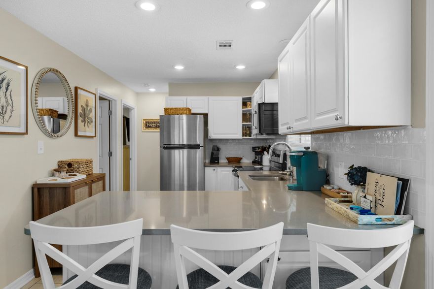 Amazing fully renovated coastal ground floor 2 bedroom 2 bathroom unit 514 at Beachside Villas in Seagrove Beach just off 30A. This turn key condo is well established rental with 10/10 on 70 reviews. The 2025 bookings are at alost $40k. Upgraded with  new tile showers, new vanities, new paint, extended cabinets in kitchen, new luxury furnishings and easy beach access.  Beachside Villas is located south of 30A in Seagrove Beach. The complex offers free shuttle service to one of largest public beach areas along 30A.  This golf cart will pick up and and shuttle you right to the beach! There is no need for finding parking or hauling your beach gear a far distance. The location of unit 514 is just steps to the white sands of the emerald coast for morning walks along the beach. As the 2nd building from the gulf it close to the sand as well as amenities.  The complex recently had a complete exterior renovation. To include new metal roof, hardie plank exterior siding, new lights, windows, doors and fiber optic internet.  This complex features 2 pools (one heated seasonly), Tennis courts, pickleball courts, outdoor grills and sitting area around the lake.  This turn key unit has new HVAC as of 2023 and water heater 2020 making it the ideal rental investment property. 

The floorplan on this unit is the larger layout of the 2 bedrooms. the extended island in the kitchen is unique to this unit and offers ample space for bar seating.  The sounds of gulf can be heard while relaxing on the balcony just off the living room.  

This unit is offered turn key and fully furnished. The condo has been in meticulous maintained and the reviews are proof. 

The new Greenway Station is just under 1.5 miles on 30a featuring coffee shop, ice cream, local cantina, high end shopping and more. 

Beachside villas are 4 miles to Seaside to the west or 5 miles to Alys to the east making it a rental guest favorite for location and amenities.  This unit has amazing actual revenue the past few years and 2025 rental calendar is filling up fast. 
