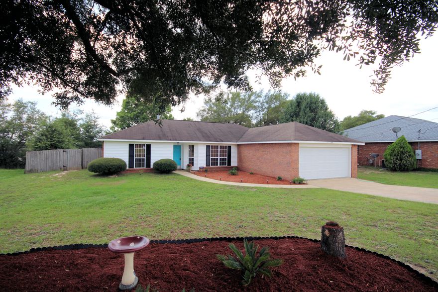 Come see this stunning, updated 3 bedroom/2 bath home, located on the easy to access south side of I-10, minutes to Duke Field,7th Special Forces Group and only 20 minutes to Eglin AFB. This home is a must see. The beautiful kitchen is adorned with quartz countertops, over-sized deep basin sink,state-of-the- art touch faucet, custom under cabinet lighting,stainless appliances and pantry. Pergo flooring throughout living room,kitchen and dining area. Master and hall baths have granite topped cabinetry and tile floors.This home has been protected with a transferable termite bond and wireless alarm system.UV air purifier is installed on the newer heating and cooling system.New garage door with removable storm support.Large fully fenced backyard, perfect for family fun and entertaining.