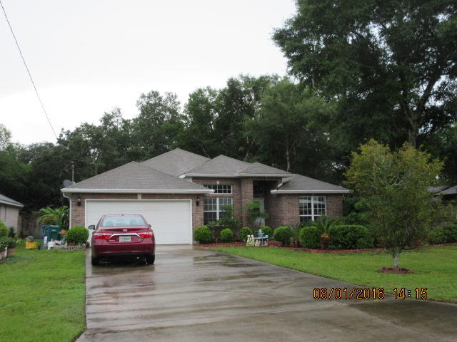 Beautiful brick home in Shalimar. No carpet in home. Easy maintenance laminate wood floor covering. Tile in kitchen. Enjoy the easy care lot and enjoy the HUGE screen porch overlooking lush plants. Plenty of space to entertain and enjoy!!! You won't want to miss this beauty!!!! Washer/Dryer not warranted.  NO PETS Easy access to Eglin AFB.