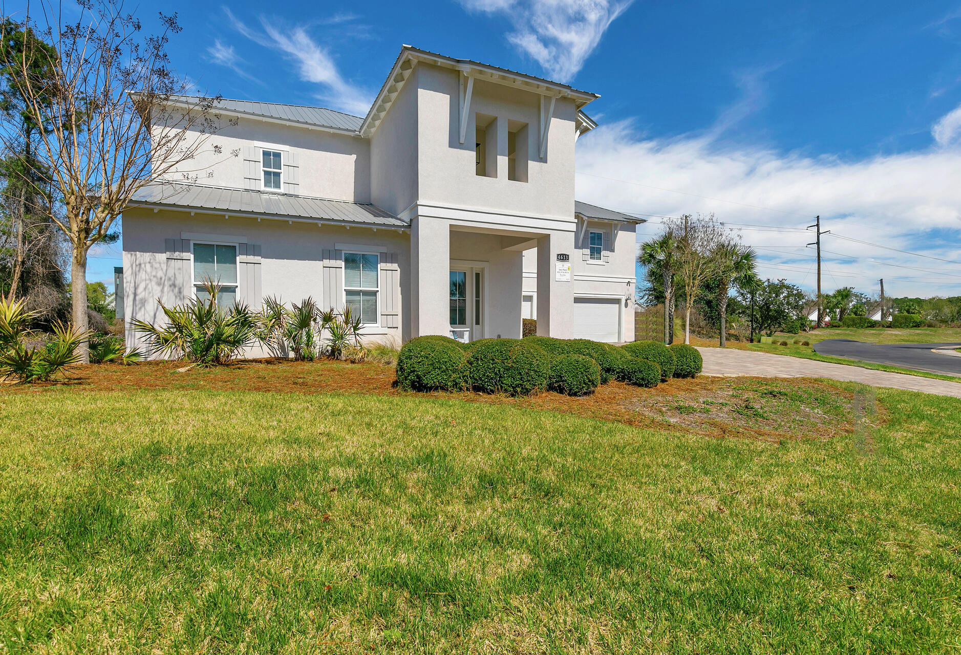 'Sea Pearl' defines luxury in the vacation rental market and is an investor's dream with 7 bedrooms, 5.5 baths, and capable of sleeping 17 guests. Built in just 2017, this premier property features luxury landscaping, a private salt-water pool, and an outdoor shower. Complete with two kitchens each with granite countertops, stainless-steel appliances, two living areas, hardwood floors throughout, a space for entertaining which accommodates ping pong and foosball tables. A rare find at the beach is a three car garage and plenty of driveway space for parking, all within 500 yards to the beautiful Emerald waters. This home is ideally located in one of the most sought-after exclusive neighborhoods on the Emerald Coast - gated Destiny West. The community includes a pool and hot tub, exercise room plus tennis courts. Take a quick troll down to the famed Crab Trap or jump in your golf cart and head to all of the shops at Destin Commons. Scenic Highway 98 is lined with a gorgeous paved path for all of your walking and biking adventures. Do not miss this rental machine in the best part of town!