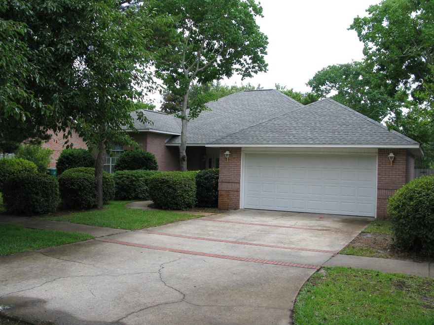 Move in Condition. Lots of room for you and your family. Short walk to the public beach access from this home. Home has been freshly painted and has new carpeting. Great eat in Kitchen for cooking and entertaining. Cathedral ceilings. Close to everything, restaurants, shopping and the beach.
