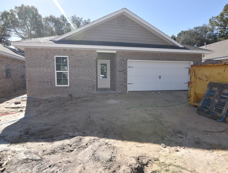 **BACK ON MARKET (at no fault of the builder) MOVE IN END OF JAN. Beautiful 3 bedroom / 2 bathroom home by a local builder. This home offers all the comforts and conveniences of modern Craftsman style living: SPLIT floor plan / His & Her Walk-In Closets / QUARTZ counter-tops / Custom, SOFT-CLOSE, shaker style, all-wood cabinets / SLATE finish GE appliances / large walk-in pantry / over-sized island w/ breakfast bar! Note: Pictures are of a home by the same builder with similar finishes & floor plan. Some details depicted may not be exactly the same.