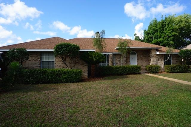Accepting Backup Offers -----All Brick home in secluded Community South of Hwy 98. Only 3 blocks to the Beach through the neighborhood subdivision easement path. Located on the inside corner of Kel-Wen Circle, this 3 bedroom, 2 bath, home has a large fenced in backyard with a patio & spacious screened porch. Back yard is large enough for a Pool. Living room features 12ft high vaulted ceilings, a large bay window, brick fireplace and hardwood floors. The open kitchen has tiled floors, vaulted ceiling, wood cabinetry, a large breakfast bar & pantry. The split floor plan adds privacy to the Master Bedroom. 2 Guest Bedrooms share a full bath. Master Bedroom has a large walk in closet and private bath and access to back patio. Convenient central location. No HOA in this Community