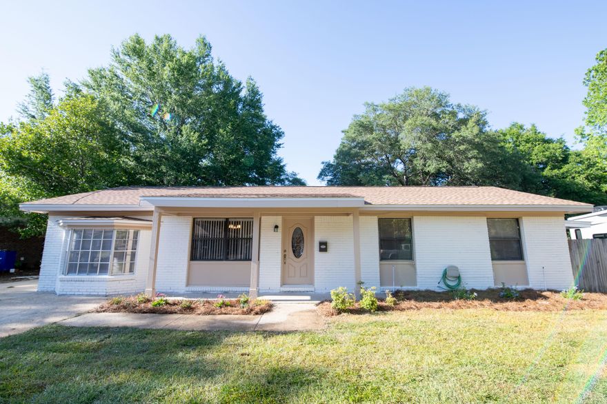 Check out this affordable 3 bedroom and 1 & half bathroom home in the heart of Niceville. It's great for a first time homeowner or smaller family. This home offers a large wood working shed in the back and a lawn shed on the side. There is a sprinkler system for the entire yard. LVT flooring was replaced in 2020 and house has tile in the bathrooms, kitchen and laundry area. The roof, skylight and refrigerator were replaced in 2020. HVAC units were replaced in 2009 as was the water heater. Some new lighting and all exterior doors have new hardware. New plants and sod in the front yard. The entire exterior of the home as been newly painted. Now is the time to make this home yours.