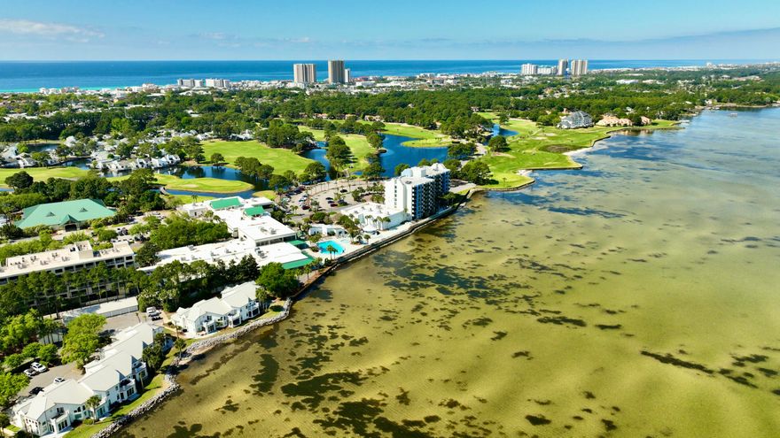 WATERRONT VIEW - EASY BAY VIEW ACCESS RIGHT OUTSIDE YOUR DOOR - FIRST FLOOR UNIT NO ELEVATOR NEEDED - Welcome to your slice of paradise in the heart of Sandestin Golf and Beach Resort, a premier gated community on the Emerald Coast. This beautifully maintained bayfront condo offers peaceful views of Choctawhatchee Bay and the perfect combination of comfort, style, and convenience.Inside, you'll find a bright, open layout with coastal-inspired finishes and plenty of natural light. Step outside to your private patio--an ideal spot for morning coffee, evening sunsets, or simply soaking in the tranquil waterfront surroundings. As a resident of Sandestin, you'll enjoy private beach access, 24/7 gated security, and a lifestyle that includes everything from fine dining and boutique shopping to golf, tennis, and family-friendly activities. You're just a short golf cart ride from the sugar-white sands, the lively Village of Baytowne Wharf, Grand Boulevard, and an array of top-rated restaurants and entertainment options.

Whether you're seeking a vacation escape, an investment opportunity, or a serene full-time residence, this bayfront condo offers the best of coastal livingall within the exclusive gates of Sandestin.