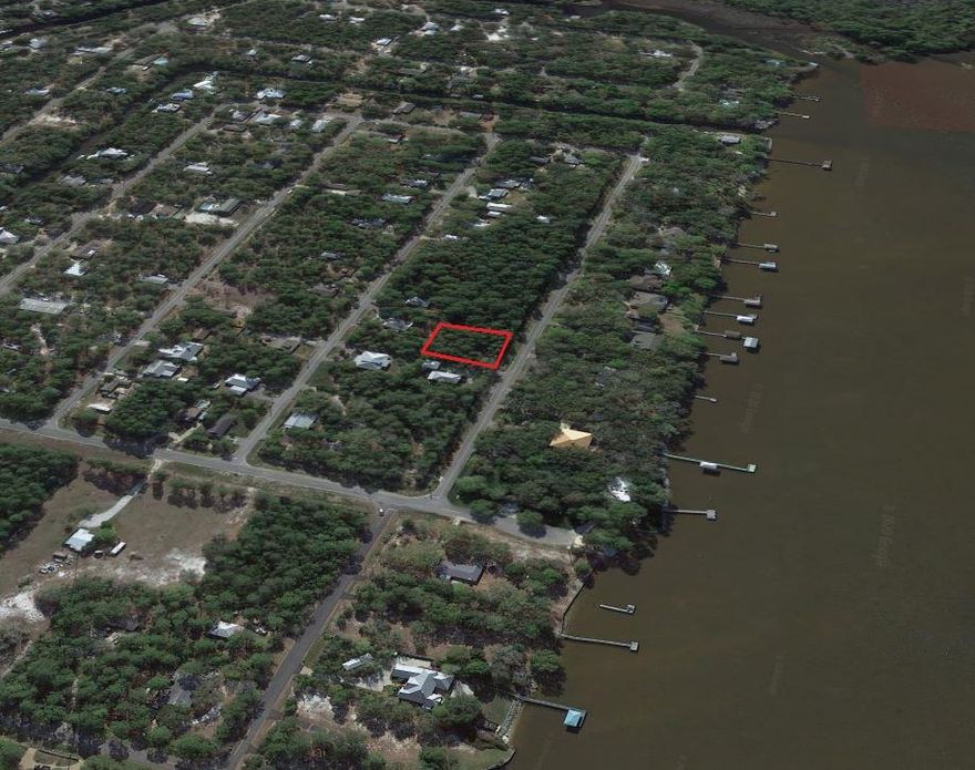 LOWEST PRICE LOT ON W MITCHELL AVE. Beautiful wooded lot in one of the most coveted streets in all of Point Washington. Directly across from the Choctawhactchee Bay, this vacant lot would allow future home to have possible bay views. No HOA or buildout time. Located in flood zone X (no flood insurance required). New construction on this street make this lot a great buy-and-hold investment or perfect to build now. The neighborhood of Daughettes S/D is seeing a lot of activity right now. 5 minute drive to Grayton Beach.