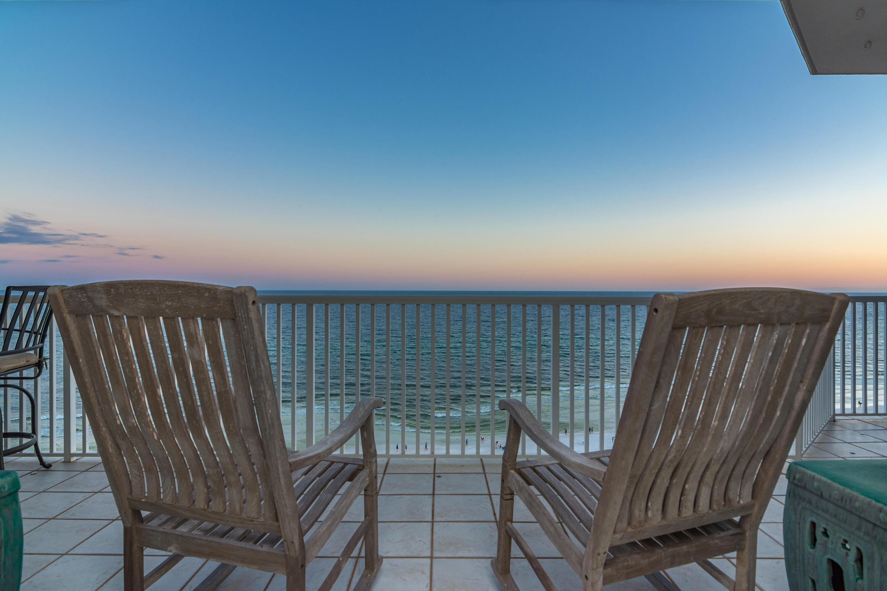 Experience awe-inspiring 180-degree unobstructed beachront views along the entire coastline from Destin to Panama City from  the 50-foot balcony of this 11th-floor corner unit! Nestled within a gated enclave, this luxurious condominium seamlessly melds comfort with sophistication.Featuring upscale touches such as authentic wooden beams gracing the ceilings,stone fireplace & accents,and bespoke solid wood cabinets crafted by a master cabinet maker, this distinctive open floorplan ensures water views from every room.With 10-foot ceilings and two separate living areas, revel in the luxury of two master suites both offering Gulf views and access to the expansive 50-foot Gulf-view balcony. A third ensuite guest bedroom adds to the allure,while a second generously sized north-facing terrace. terrace provides stunning vistas of the pool, lake, and bay, creating an ideal setting for al fresco dining. This property truly epitomizes the concept of a "Home on the Beach." The Empress is a boutique, luxury gated community consisting of only 44 units located directly across from 2,000 feet of sugar white beaches and although 14 of the units are allowed to be vacation rentals, for most owners The Empress is a full time residence or second home. Other features that make The Empress so desirable are the semi private elevators that open into a foyer shared by only you and 1 neighbor, large climate controlled storage for each owner, a more private pool and hot tub overlooking the lake and fitness room, HALO water system, fiber optics cable, full time maintenance staff, security, and the famous Whales Tail beachfront restaurant within a block for food and beverages on the beach. Walk out the door to the beach or pool, relax on one of your balconies, or experience the great entertainment, shopping and restaurants all within a short distance. Now is the time to make your dream of living at the beach a reality. (The Empress passed its required Milestone Inspections with flying colors!)