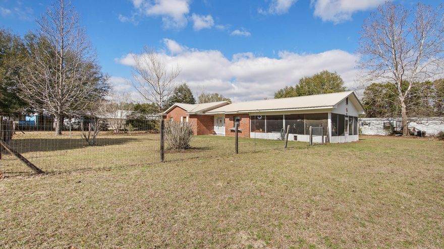 5.88 Acres with 200' Hwy 90 frontage - Located directly across from the DeFuniak Springs Municipal Airport new terminal (under construction) in the Opportunity Zone. Urban Residential is the current zoning and future land use; this allows for multifamily, so it is an ideal opportunity for the proverbial ''family compound'' or adding a rental property. See docs section for details on density, allowed uses, etc. Or live in the house and build out your commercial dream business in the front. Potential rezoning to commercial, as the surrounding properties are commercial now. Walton Co Planning is the source for any zoning questions or changes. Endless possibilities await. Home is neat as a pin and excellently maintained.