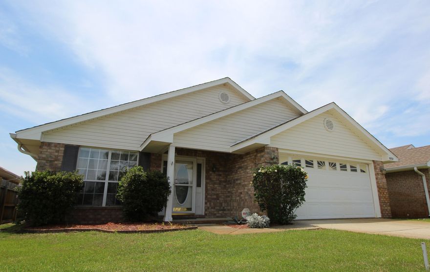 FANTASTIC WELL MAINTAINED ALL BRICK HOME SITUATED IN A QUIET GATED COMMUNITY! Step inside to find a separate living/formal dining room with a vaulted ceiling and large picture window. Spacious family room has a high cathedral ceiling, plant ledge, fireplace that is plumbed for gas and sliding glass doors that lead out to a wonderful Florida room that is not included in the square footage. Light and bright kitchen with lots of counter space and cabinets, deep porcelain sink, upgraded appliances and a large breakfast bar. Inside laundry. Large master bedroom and a private bath with double vanities, large shower w/ seat and a walk-in closet. Split bedroom floor plan allows you additional privacy. Two additional bedrooms and a full bath complete this perfect package.