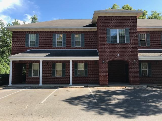Price reduction! Professional 1st floor office with 1 office with glass pass-thru window to waiting room, 1 private office, 1 larger room with sink/counter & cabinets for break room, waiting room, and 1 ADA bathroom.