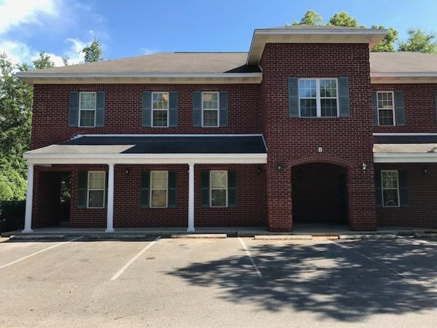 Price reduction! Professional 1st floor office with 1 office with glass pass-thru window to waiting room, 1 private office, 1 larger room with sink/counter & cabinets for break room, waiting room, and 1 ADA bathroom.