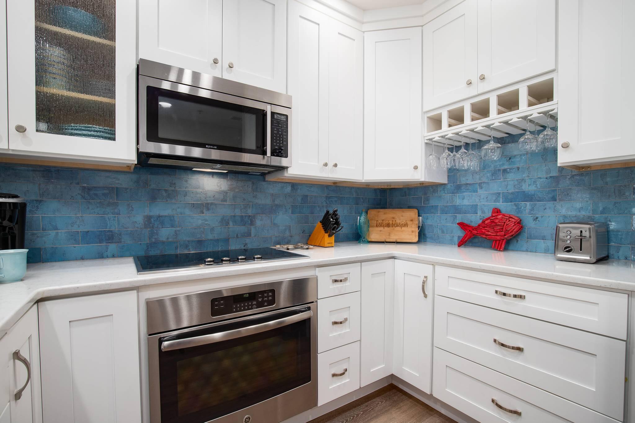 Discover a coastal sanctuary where investment opportunity meets luxury living in Blue Mountain Beach, positioned along the exclusive 30A corridor. This 2.5-bedroom, 2-bathroom condominium offers exceptional returns and personal enjoyment with the 30A lifestyle. This property's private bunk room configuration--thoughtfully added by current owners--transforms this residence into the only unit of its kind within Redfish Village. Strong rental performance shows impressive 2025 income available for serious inquiries.The primary bedroom suite serves as a tranquil haven with balcony access, walk-in closet space, and well-appointed bathroom with separate shower and soaking tub. The guest suite features a double-sink bathroom configuration that enhances both guest satisfaction and rental appeal. The walk-in closet includes an additional locked owner's closet, providing excellent organization solutions.
Your private balcony offers a front-row seat to nature's symphony, where rhythmic wave sounds create an enchanting soundtrack from nearby shores. The completely reimagined gourmet kitchen inspires culinary enthusiasts with gleaming quartz countertops, designer backsplash artistry, and premium Viking and Jenn Air appliances. The refined beachy color palette flows throughout luxury vinyl flooring, creating atmosphere that captures coastal living. Practical amenities include covered parking and in-unit laundry facilities.
Redfish Village residents enjoy exclusive privileges including access to approximately three-quarters of an acre of gated private beachfront with seasonal beach chair and umbrella service. The community's seasonal tram service eliminates the walk to shore, while additional amenities include a lakefront community pool, community room, poolside grilling stations, and playground facilities.
The renowned 30A bike trail system connects cycling enthusiasts through accessible paths linking beaches and charming coastal communities while providing stunning Gulf views. Scenic trails meander through the property, providing direct access to pristine lakefront experiences.
Adjacent Red Fish Taco delivers exceptional cuisine alongside an electrifying live music scene, placing you at the epicenter of 30A's entertainment culture. Blue Mountain Bakery offers artisanal coffee and freshly baked pastries, while Cowgirl Kitchen provides exceptional dining experiences showcasing diverse flavors defining the 30A culinary landscape.
This extraordinary investment opportunity seamlessly weaves together resort-quality luxury amenities and prime 30A positioning to create an unparalleled coastal lifestyle experience