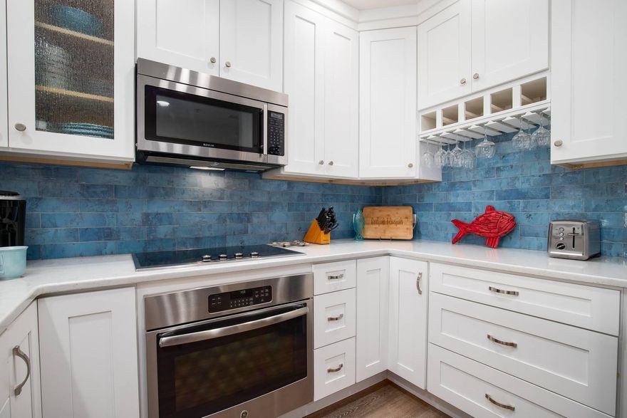 Discover a coastal sanctuary where investment opportunity meets luxury living in Blue Mountain Beach, positioned along the exclusive 30A corridor. This 2.5-bedroom, 2-bathroom condominium offers exceptional returns and personal enjoyment with the 30A lifestyle.  This property's private bunk room configuration--thoughtfully added by current owners--transforms this residence into the only unit of its kind within Redfish Village. Strong rental performance shows impressive 2025 income available for serious inquiries.The primary bedroom suite serves as a tranquil haven with balcony access, walk-in closet space, and well-appointed bathroom with separate shower and soaking tub. The guest suite features a double-sink bathroom configuration that enhances both guest satisfaction and rental appeal. The walk-in closet includes an additional locked owner's closet, providing excellent organization solutions.
Your private balcony offers a front-row seat to nature's symphony, where rhythmic wave sounds create an enchanting soundtrack from nearby shores. The completely reimagined gourmet kitchen inspires culinary enthusiasts with gleaming quartz countertops, designer backsplash artistry, and premium Viking and Jenn Air appliances. The refined beachy color palette flows throughout luxury vinyl flooring, creating atmosphere that captures coastal living. Practical amenities include covered parking and in-unit laundry facilities.
Redfish Village residents enjoy exclusive privileges including access to approximately three-quarters of an acre of gated private beachfront with seasonal beach chair and umbrella service. The community's seasonal tram service eliminates the walk to shore, while additional amenities include a lakefront community pool, community room, poolside grilling stations, and playground facilities.
The renowned 30A bike trail system connects cycling enthusiasts through accessible paths linking beaches and charming coastal communities while providing stunning Gulf views. Scenic trails meander through the property, providing direct access to pristine lakefront experiences.
Adjacent Red Fish Taco delivers exceptional cuisine alongside an electrifying live music scene, placing you at the epicenter of 30A's entertainment culture. Blue Mountain Bakery offers artisanal coffee and freshly baked pastries, while Cowgirl Kitchen provides exceptional dining experiences showcasing diverse flavors defining the 30A culinary landscape.
This extraordinary investment opportunity seamlessly weaves together resort-quality luxury amenities and prime 30A positioning to create an unparalleled coastal lifestyle experience
