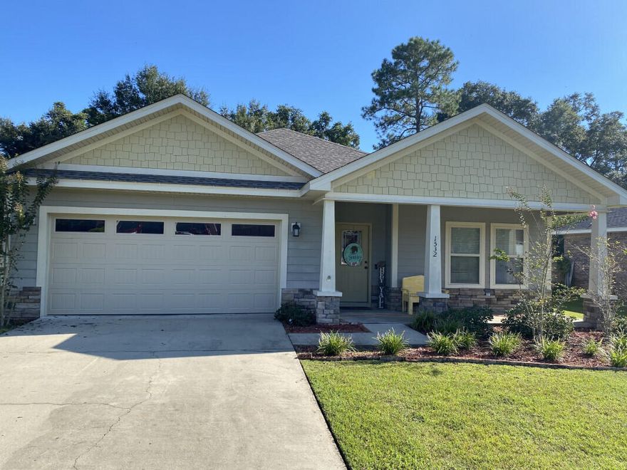 Built in 2016, this 3 bedroom 2 bathroom home is in the heart of Baker on a quiet, single cul-de-sac street, just 2 blocks from Baker School. Only a 3 red-light commute all the way to Duke Field!. Granite counter tops in kitchen and both bathrooms; 9 foot ceilings and tile throughout with carpet only in the bedrooms. Dishwasher was replaced in 2020. Fresh paint in main living areas. Master bath features separate tub/shower. Fenced in yard features a deck off the back of the home and fire-pit for s'mores and drinks! Take the back route, and half your drive is just beautiful paved country roads!