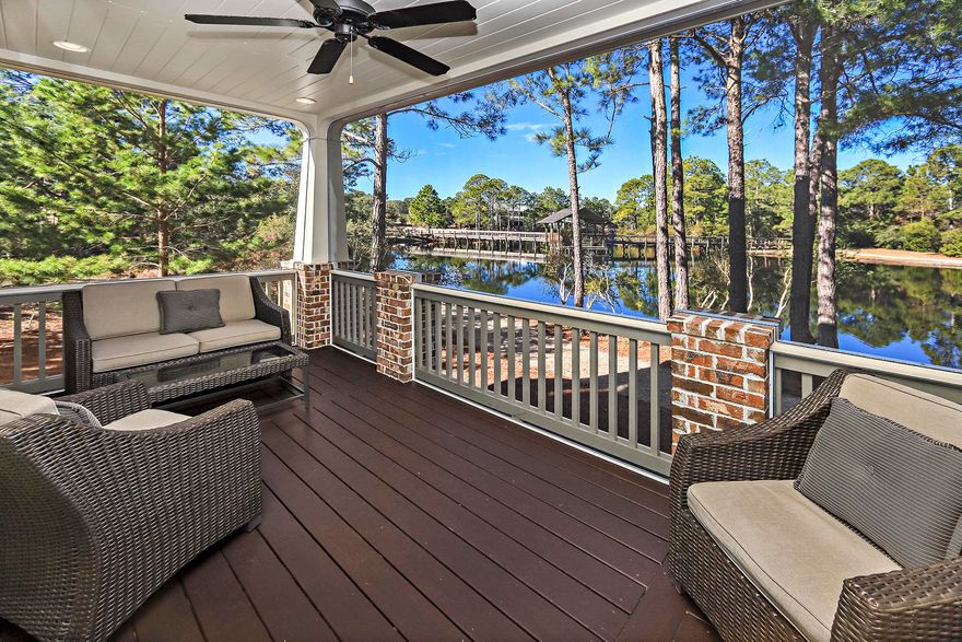 Lakefront in the heart of Blue Mountain! Rare find, don't miss this opportunity. This immaculate light filled home is move in ready. With beautiful westerly lake views in a serene setting. Forest Lakes is a gated community, with a large community pool, a large entertaining pavilion surrounded by winding tree lined streets and trails. This home has many upgrades including custom plantation shutters, many built in's including a desk in the loft area, a security system, and fabric hurricane panels. The large upstairs master bedroom has a large porch overlooking the lake for your daily yoga. In addition there is a garage with a interior storage room for all your beach essentials which is a huge plus on the 30A corridor. Beach access is a short distance away at highway 83. This is one to see..