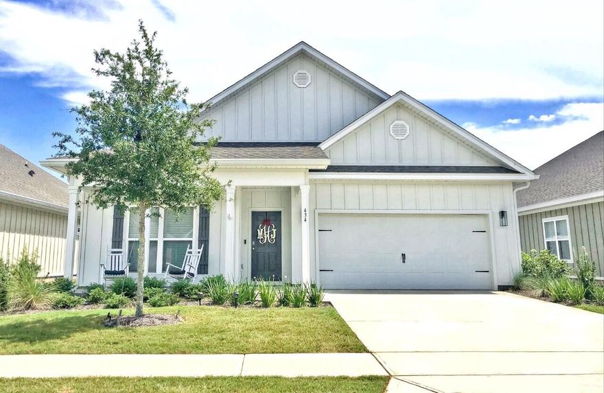 Welcome to Firefly of Hammock Bay! You will love the 'Dover floor plan' This home has so much to offer and it's ready to move in, no waiting for it to be built! It is a Smart home with a video doorbell. Beautiful kitchen with granite counters, oversized island with breakfast bar with storage cabinets and power outlets. Stainless steel Whirlpool appliances and a purified kitchen sink water dispenser. Also has a Large walk in pantry. Beautiful open concept to a large family and dining area, 9 ft ceilings with crown molding in Kitchen, dining and family room. Luxury waterproof vinyl plank flooring in a all areas except carpet in bedrooms, extra tall 6' baseboards, canned lighting and wide door openings.