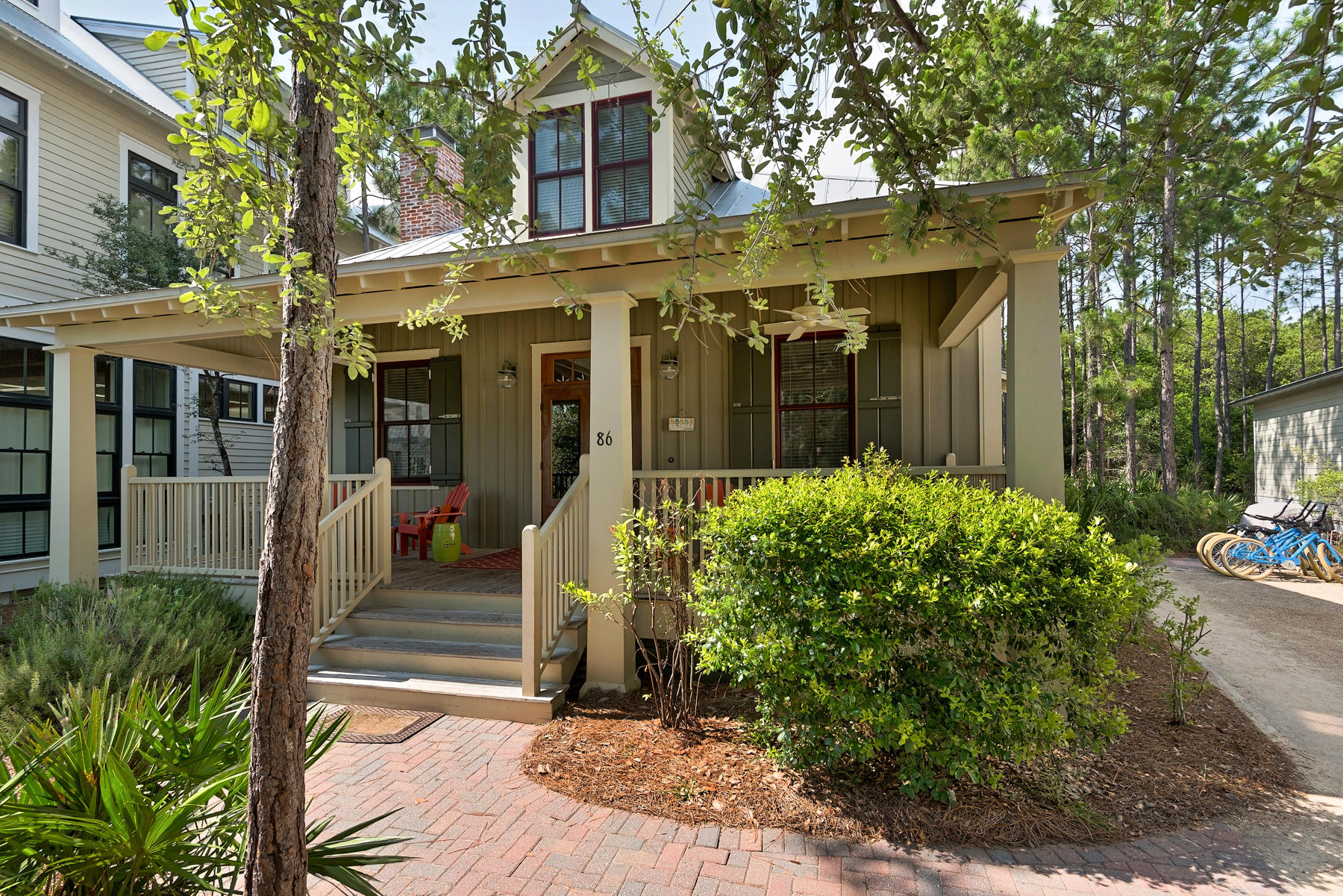 This beautifully decorated home at 86 Thicket Circle is perfect for a family get together or a large group of friends. There are two master bedrooms located downstairs. One suite includes a king bed, a separate shower and clawfoot tub, while the other suite has a queen bed and a tub and shower combination. Two bedrooms are upstairs, one with a queen bed and the other with two twin beds. Each room upstairs has its own vanity area and private access to the tub and shower combination. A set of bunk beds is also located in the upstairs hall and there is a sleeper sofa in the living room.This home has a fully equipped gourmet kitchen, featuring stainless steel appliances and granite counter tops. The dining table, with two additional