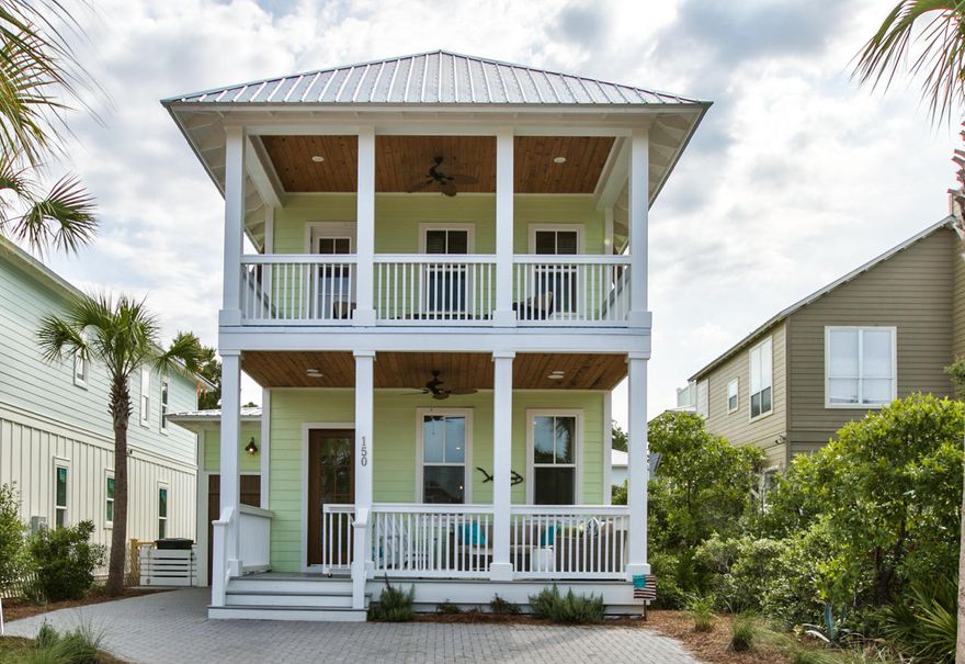 Turn key ready! NEVER BEEN RENTED home in Seacrest Beach backs up to a green space with trails throughout. The storage area is perfect for parking a golf cart, storing beach gear, or bikes to cruise along the 18 mile long path that runs alongside Highway 30A. TWO Master Bedrooms both with designer baths which offers a double vanities, separate shower. Driftwood color hardwood floors throughout the entire homes. Chic beach dcor throughout entire home. Surround sound with satellite radio. The spacious living room, dining room, and chef's kitchen are open concept. Home is being sold furnished with some exceptions. All measurements are approximate.