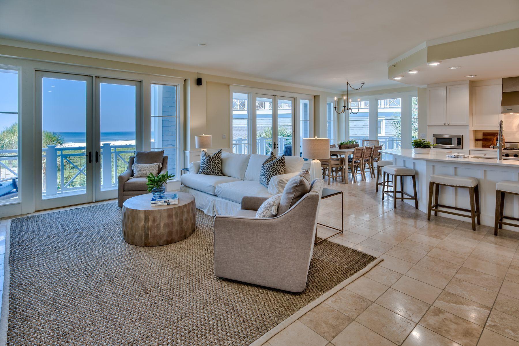 Move into this newly renovated three-bedroom condo in WaterSound Beach and enjoy all the benefits of this exclusive gated community. Accessed by elevator, this coveted corner end unit has a wraparound balcony delivering breathtaking gulf views with a choice of sunshine and shade at all times. Laura McKee of Dwell Interiors has weaved her magic with alluring new furnishings, handpicked artworks, rugs and home accents all included in the sale. Three bathrooms have also received an update to complement the soaking tub, beautiful tiles and modern vanities. The open plan living room is a spacious area for relaxing and entertaining. Throw open the double sets of French doors and enjoy the gentle sea breeze and glorious views across the dunes and Gulf of Mexico.