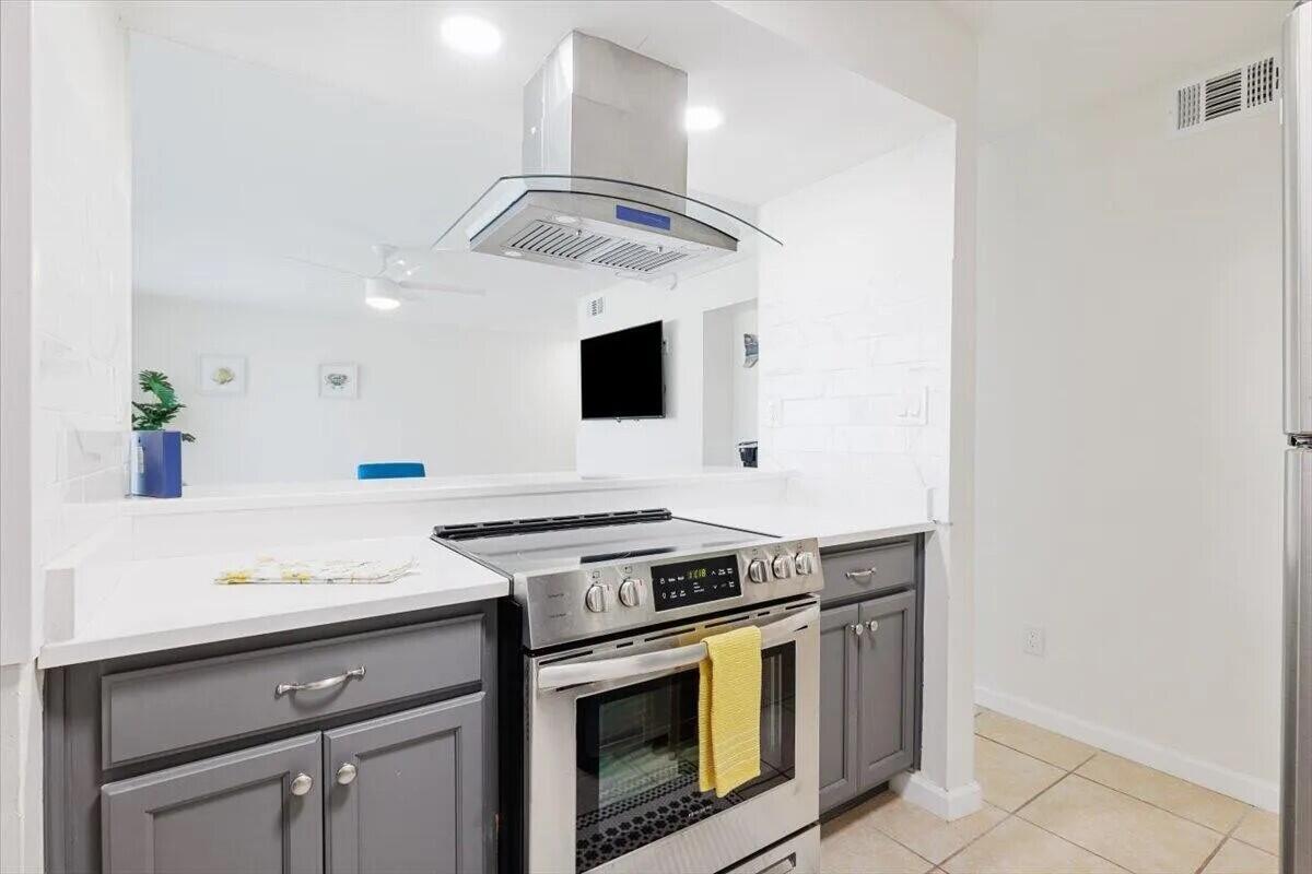 Destin 2BR 1BA Clean and Spacious Condominium located on the first-floor next to one of the pools presents a fantastic investment opportunity, NO RENTAL RESTRICTIONS, allowing for flexible income potential. Condo is remodeled, new HVAC, new Water Heater, copper wiring, modern ceiling fans, smart TV's, stainless steel appliances, laundry room. Pet Friendly Community, No Flood Zone!Community Features: gated entrances from HWY 98 and Airport Rd, Access to 3 swimming pools, Tennis / Pickleball court, EV chargers and a clubhouse for owners. HOA Coverage: The monthly fee covers building insurance and exterior maintenance, water, internet, sewer, trash, landscaping, and maintenance of pools and gates, ensuring low maintenance for the homeowner. See More Section. The condo is furnished King size Bed, queen size bed and twin bunk beds. Complex has BBQ/Picnic areas, abundance of green spaces, ample free parking, remodeled pools & bathrooms. No special assessments.