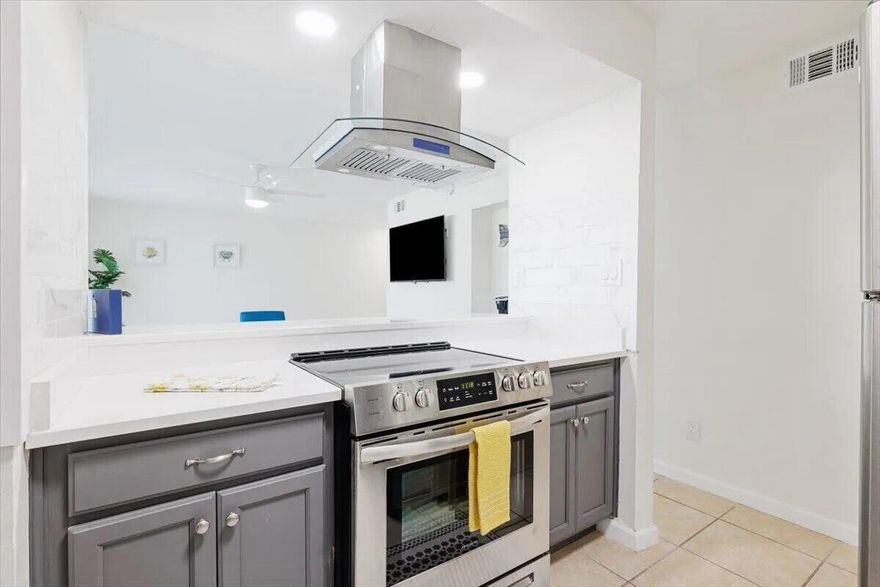 Destin 2BR 1BA Clean and Spacious Condominium located on the first-floor next to one of the pools presents a fantastic investment opportunity, NO RENTAL RESTRICTIONS, allowing for flexible income potential. Condo is remodeled, new HVAC, new Water Heater, copper wiring, modern ceiling fans, smart TV's, stainless steel appliances, laundry room. Pet Friendly Community, No Flood Zone!Community Features: gated entrances from HWY 98 and Airport Rd, Access to 3 swimming pools, Tennis / Pickleball court, EV chargers and a clubhouse for owners. HOA Coverage: The monthly fee covers building insurance and exterior maintenance, water, internet, sewer, trash, landscaping, and maintenance of pools and gates, ensuring low maintenance for the homeowner. See More Section. The condo is furnished King size Bed, queen size bed and twin bunk beds. Complex has BBQ/Picnic areas, abundance of green spaces, ample free parking, remodeled pools & bathrooms. No special assessments.  