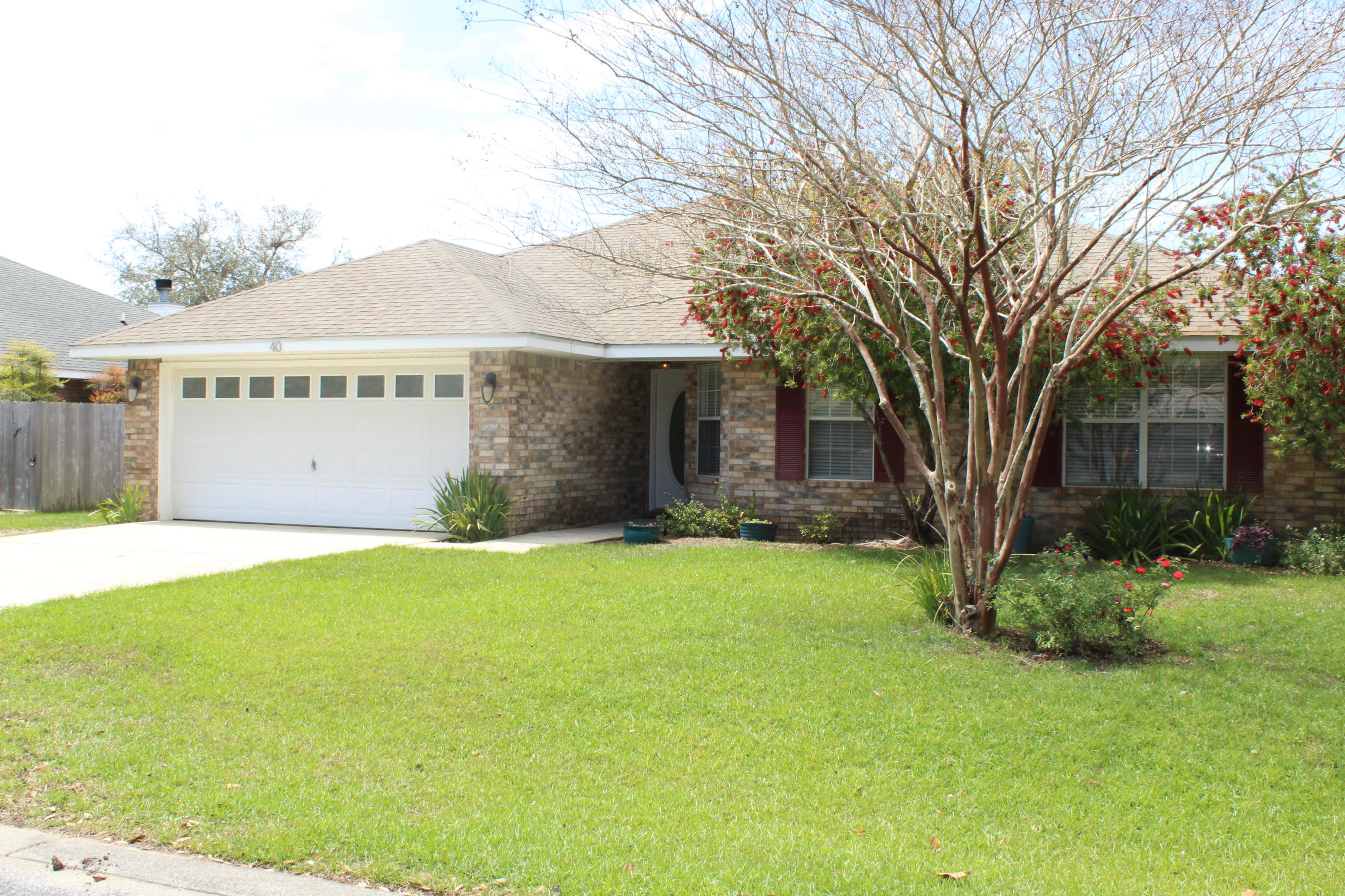 Located in quiet neighborhood close to sandestin and shops , restaurants, and Sacred Heart hospital. The neighborhood has a community pool.Vaulted ceiling with Cypress wood is one of the upgrades in this home, Back yard is feced with great outdoor living area. Home has split bedroom plan and a 2 car garage.