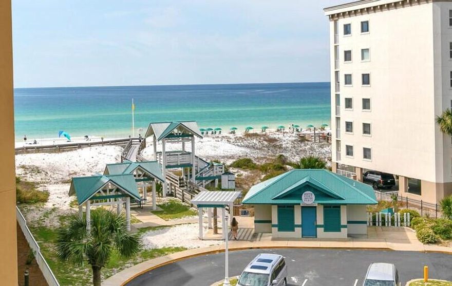 BEST of Both Worlds! Located in the highly sought after Azure Beach Resort on Okaloosa Island, this rare 3/2 END unit with extra windows, and extra large balcony has views of BOTH the gulf and the Sound.  Located on the ''quieter'' end of the resort, this unit is perfect for full time beach living, or as an investment, with rental projection at almost $70K a year! This Freshly painted condo features beautiful all hard flooring, newer appliances, newer A/C/ Water heater, high end furnishing and so much more!  Azure is a luxury beach resort located directly on the gulf, it offers private beach access, 2 large pools, splash pad, gated parking structure, owners cage storage and much more. The HOA is well managed w/ no current special assessment. Priced to sell,don't miss this rare opportunity