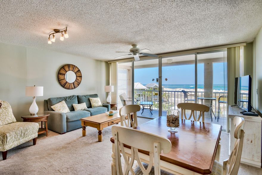 Excellent views of the Destin East Pass, Gulf of Mexico and Crab Island from this 4th floor condo at Magnolia House located in the gated island community of Destin Pointe. The large balcony affords spectacular views of the beach, water and some rather amazing sunsets. The bedroom features a king size bed, flat screen TV, & access to a private lanai. The living space is an open concept with the kitchen, dining and living area all enjoying views of the water. This property is an ideal 2nd home or investment property with $30,000/year in rental income. Destin Pointe is a private, gated island community located in the heart of Destin's harbor district. It features 24 hour security, 3,000' of deeded beach access, two lakes...
