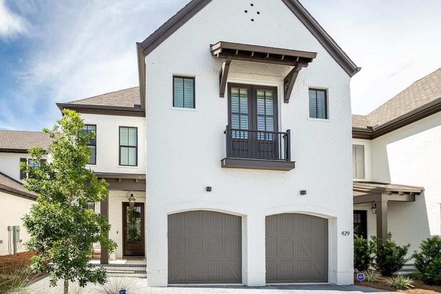 Step into refined coastal living with the Normandy floor plan at Ridgewalk, a French inspired masterpiece designed with timeless style and modern luxury. This home is beautifully appointed with shiplap detailing throughout, hardwood floors, and custom designer finishes. The open concept gourmet kitchen is a true showpiece, featuring a walk in pantry with floating shelves and a beverage refrigerator, along with premium appliances and natural gas for cooking. A pocket office adds convenience for today's lifestyle, while spacious living area flow seamlessly to the outdoors, where a built in summer kitchen awaits for effortless entertaining. The master suite is a private retreat, offering a spa like bath and an expansive walk in closet. Seller to extend builder's home warranty at contract.