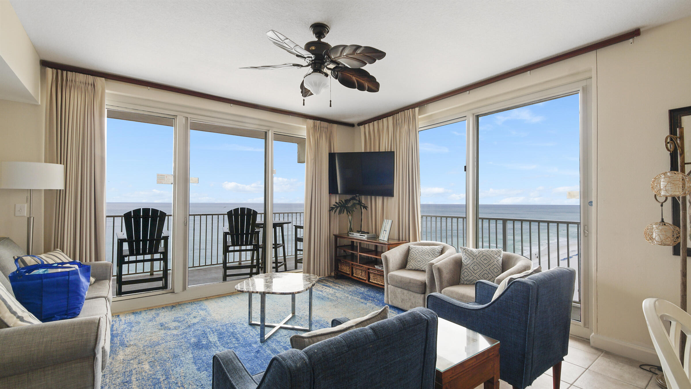 Catch incredible sunsets from this gorgeous CORNER Unit in Panama City Beach. THIS IS THE UNIT TO OWN! Rarely available, this SW corner, 3 Bed, 3 bath condo has stunning full oceanfront views of the beach from its wrap-around balcony and large windows. Fabulous layout includes 2 large main suites, and a third bedroom with twin beds. Each of the 3 bedrooms has an en suite bathroom with wide doors. The 1407 s/f unit is full of light with windows in every room. Two assigned parking spots one located on the 12th floor as close to the unit as you can get for easy access. Just drive up, walk in, and enjoy! Amazing building amenities. Large lagoon pool, indoor heated pool, both indoor and outdoor jacuzzis, and work-out room. Walk right out to the beach or lounge around the pool. Quiet unit away