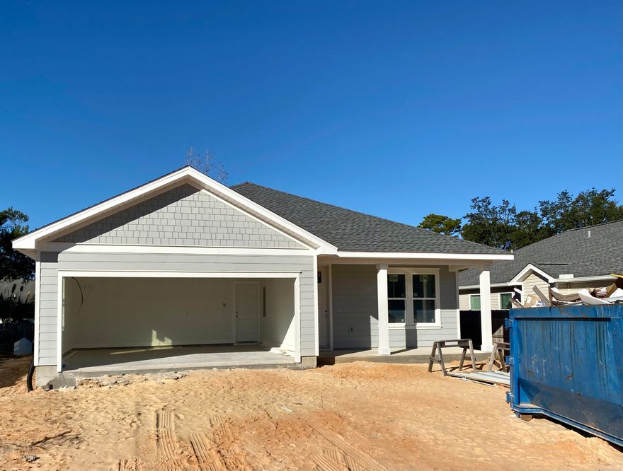 BRAND NEW 3 BEDROOM IN POPULAR AND SUPER CONVENIENT CENTRAL LOCATION! Home offers a split floor plan plus 2 covered porches and a spacious 2 car garage. You'll love the look & feel of 10' tray ceilings in Living room & master bedroom, the luxury vinyl flooring, granite counter tops, Stainless appliance package, and soft close cabinetry. Low maintenance landscaping allows for more free time to explore, relax on the beach and visit restaurants and the many events happening in Panama City Beach. You will be the envy of home owners everywhere on the beach with this large fenced lot. Room for a pool, shed, detached garage and all your toys.  Home features hurricane screens & 1 YR Builder Warranty. Photos are from previously built home. Est completion July 29. Buyer to verify info & dimensions.