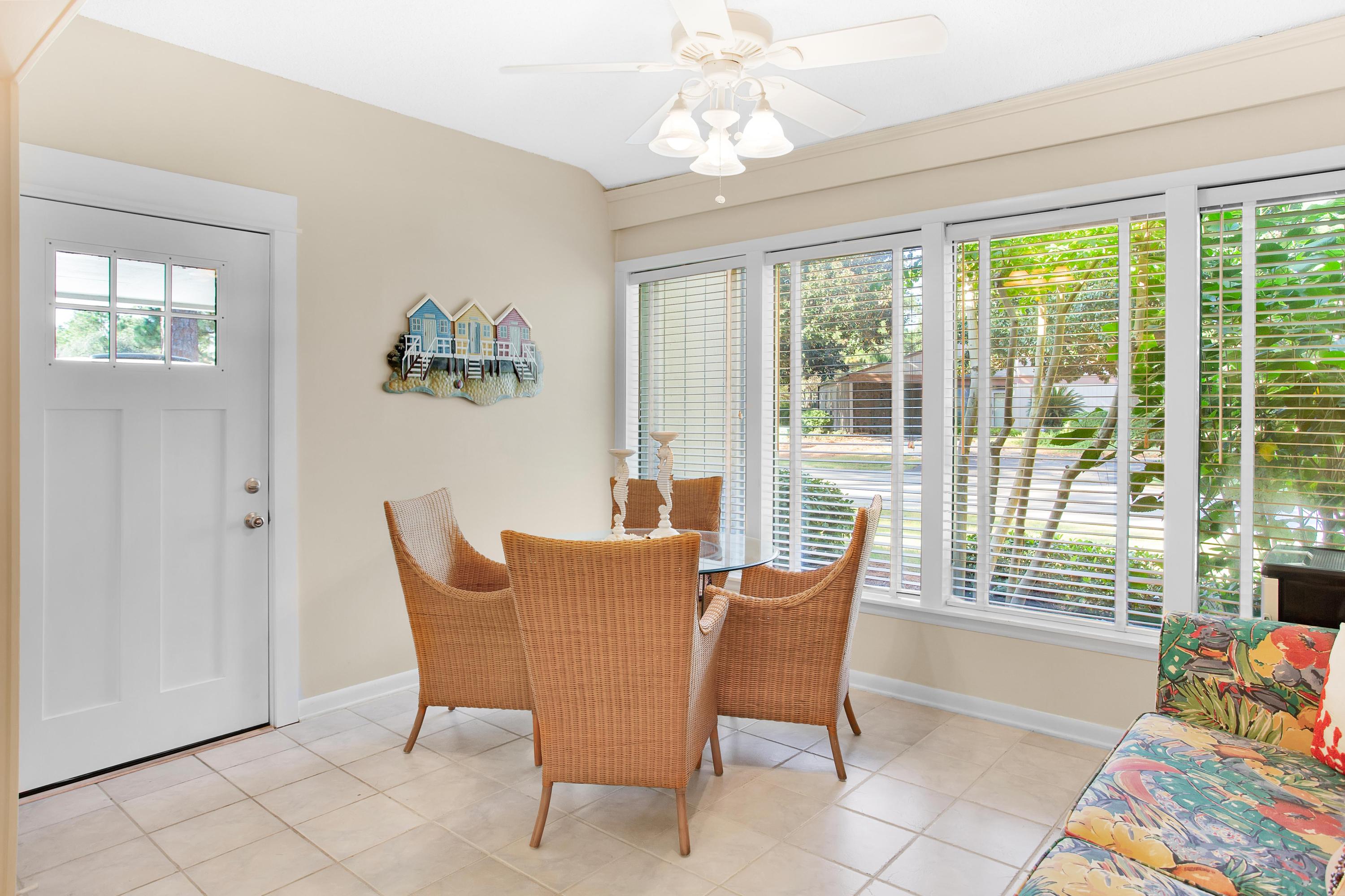 Nestled on a large corner lot, this three bedroom home is being sold fully furnished. Enter from the covered carport into the converted screen-porch, that has been enclosed for additional heated and cooled space, perfect for your morning coffee, home office, or an additional entertaining space. Tile flooring, allowing for easy cleaning, is throughout the living areas & kitchen. The private patio allows owners and guest the perfect space to enjoy a friendly conversation or a quiet spot to relax. The master bedroom has its own private bathroom featuring a walk-in shower. Enjoy the best of both worlds: the privacy of a detached single-family home with the care-free lifestyle of a condo. As an introduction to the Sandestin lifestyle, we invite our new owners to explore amenities that make Sandestin special. The listing brokerage and seller(s) are presenting the buyer(s) of this property with (2) 90-minute rounds of Tennis court time, a golf foursome at one of our three championship courses, and a round of golf for up to four (4) players at the unrivaled Burnt Pine Golf Club.
Sandestin Golf and Beach Resort is a major destination for all seasons and all ages, and has been named the #1 resort on Florida's Emerald Coast. This magical resort spanning over 2,000 acres is comprised of over 70 unique neighborhoods of condominiums, villas, town homes, and estates. The resort features miles of sandy white beaches and pristine bay front, four championship golf courses, a world-class tennis center with 15 courts, 4 resort swimming pools (and 15 private neighborhood pools), a 123-slip marina, a fully equipped and professionally staffed fitness center and spa, meeting spaces and The Village of Baytowne Wharf, a charming pedestrian village with events, shopping, dining, family entertainment and nightlife. For true golf cart community living, Grand Boulevard is just outside the resort gates and provides access to additional shopping, dining and entertainment, all without traveling on Hwy. 98. Come to Play, Stay for Life!