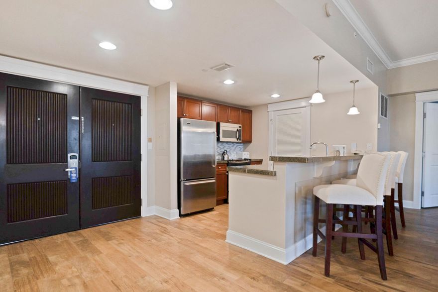 A 7th floor, fully updated condo in the outstanding Grand Sandestin which is nestled inside the sought-after, Sandestin Resort. Through the double doors you will be pleased to find one of the largest units available with 12 foot ceilings, freshly painted and new tile floors. This condo enjoys a view of Choctawhatchee Bay from the large balcony, a truly relaxing space with ample room for resting after a day at the beach or golfing. A large master suite with private view features a newly added king size bed and matching furnishings, wonderful closet space, and fully equipped en suite with soaking tub, tiled walk-in shower and dual sink vanity. The second bedroom is on the other side of the unit just past the dining area and balcony exit. This room has a king sized bed and easy access to