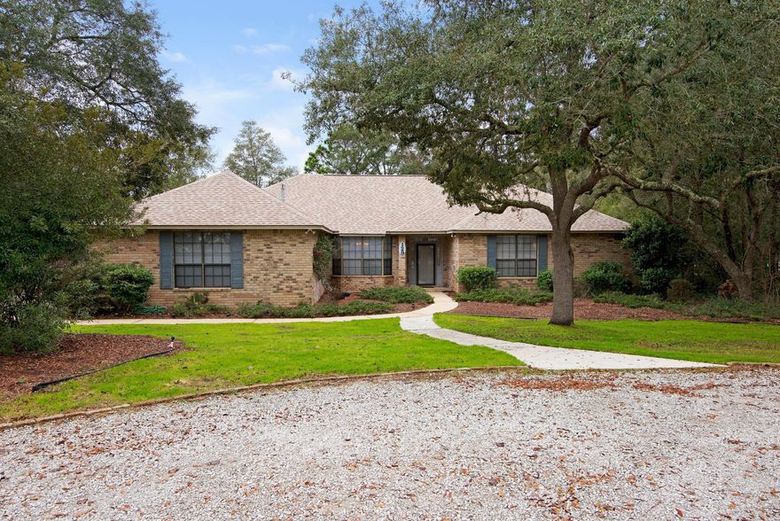 If you like the outdoors you have got to see this house. It is a gardener's dream. This house is a blank canvas waiting or you to put your personality on it. It features dual master suites. The lay out open but provides privacy. A fantastic covered pool and separate hot tub area. The lot is full of mature trees that make a beautiful shade canopy